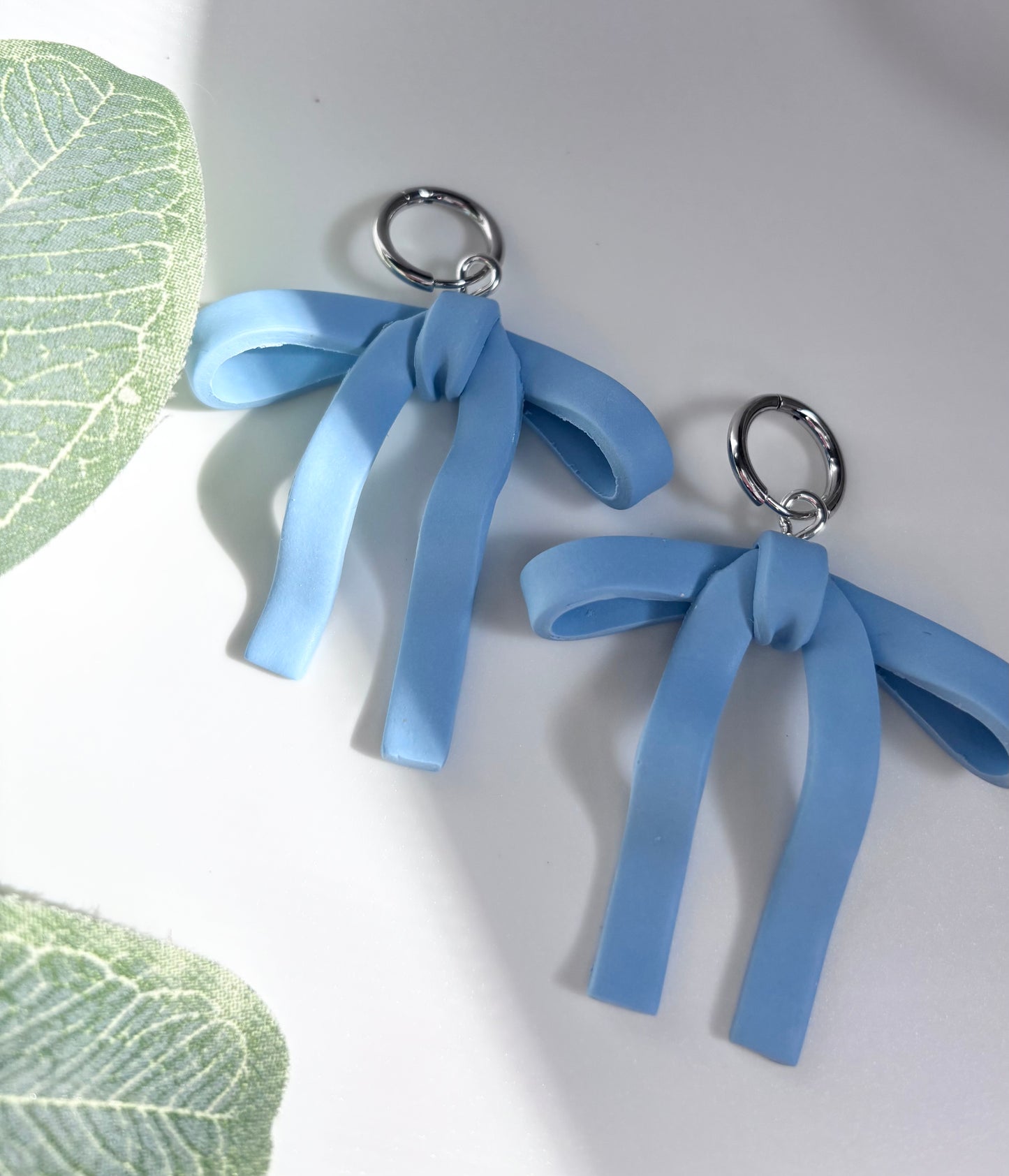 droopy bows in baby blue