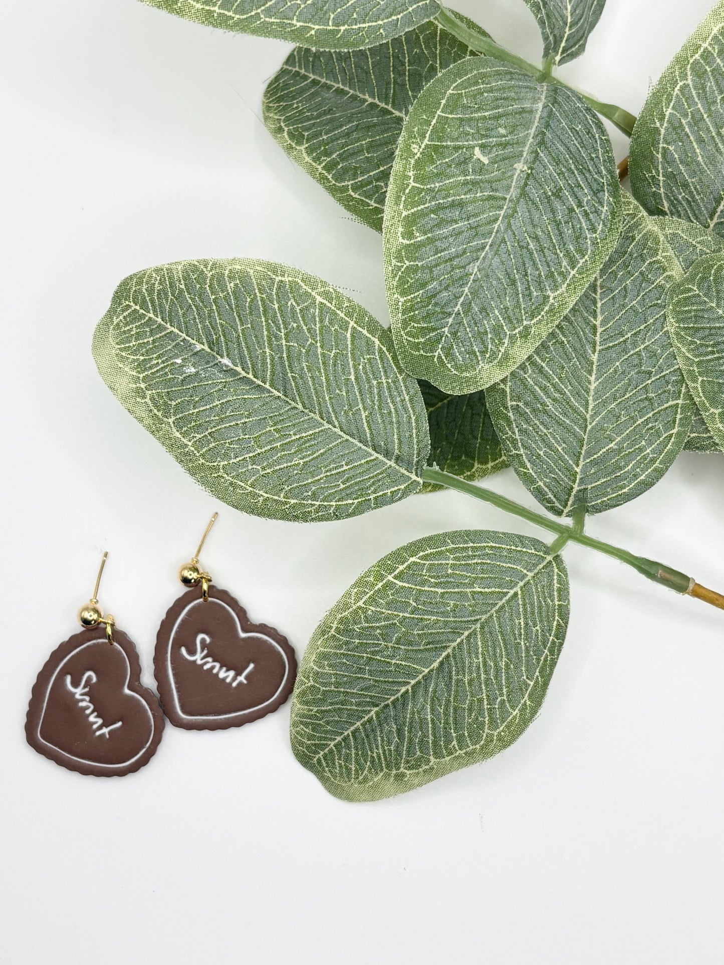 smut heart dangles