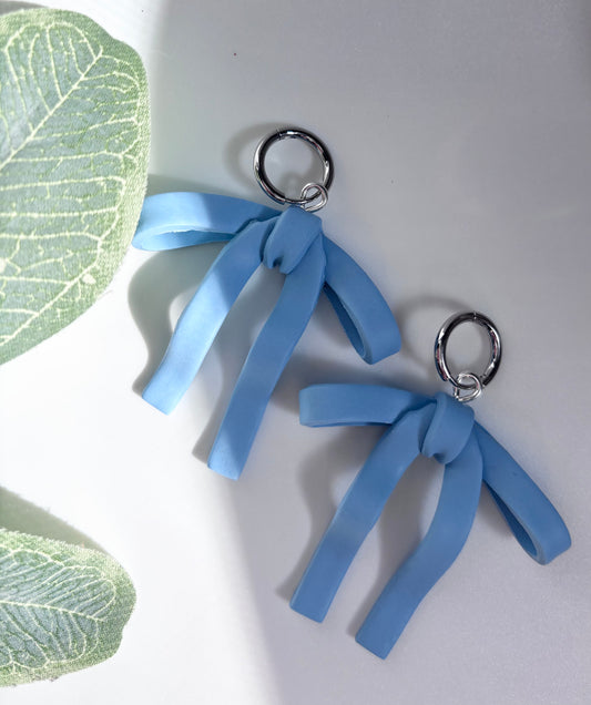 droopy bows in baby blue